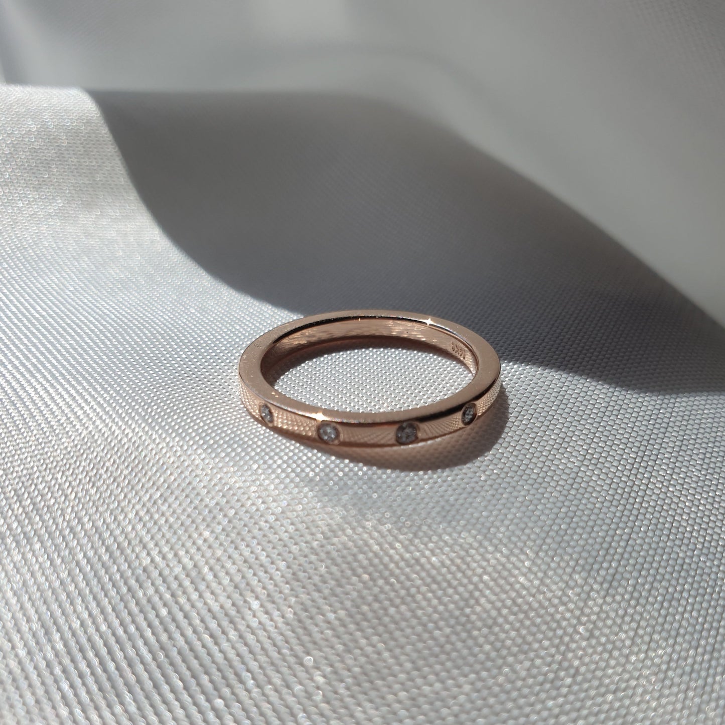 14K rose gold wedding band with 4 natural diamonds 