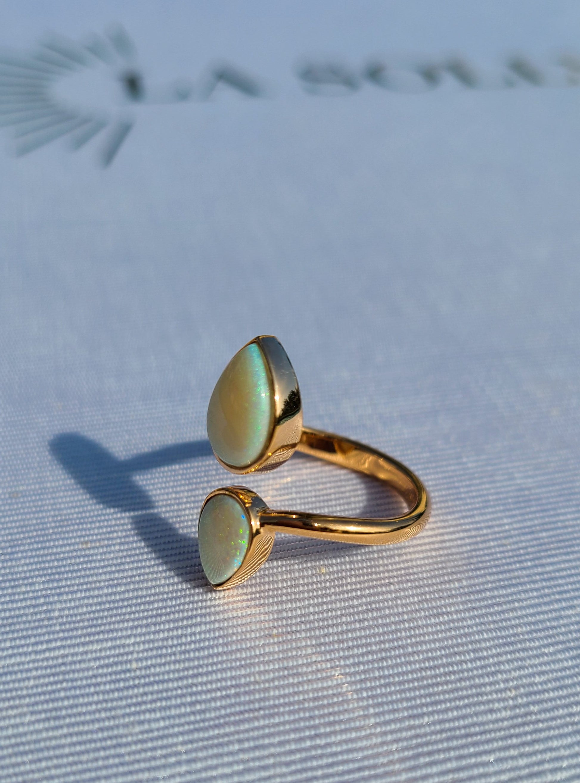 2 pear shape opal gemstone ring in 14K rose gold