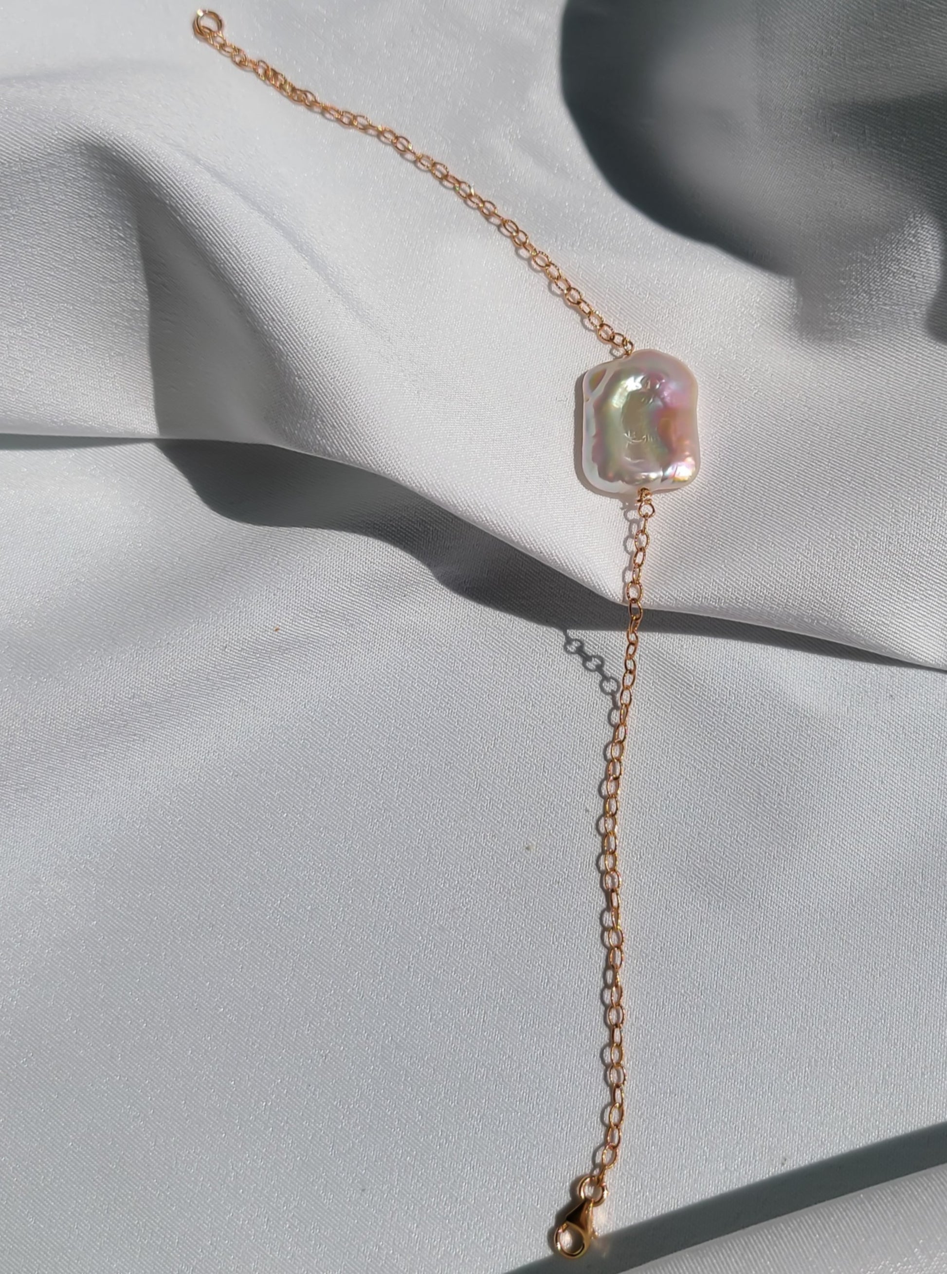 A stunning square or round shape freshwater big pearl bracelet on 14K gold chain