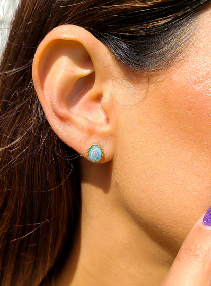 Beautiful oval shape opal earrings in 14K gold