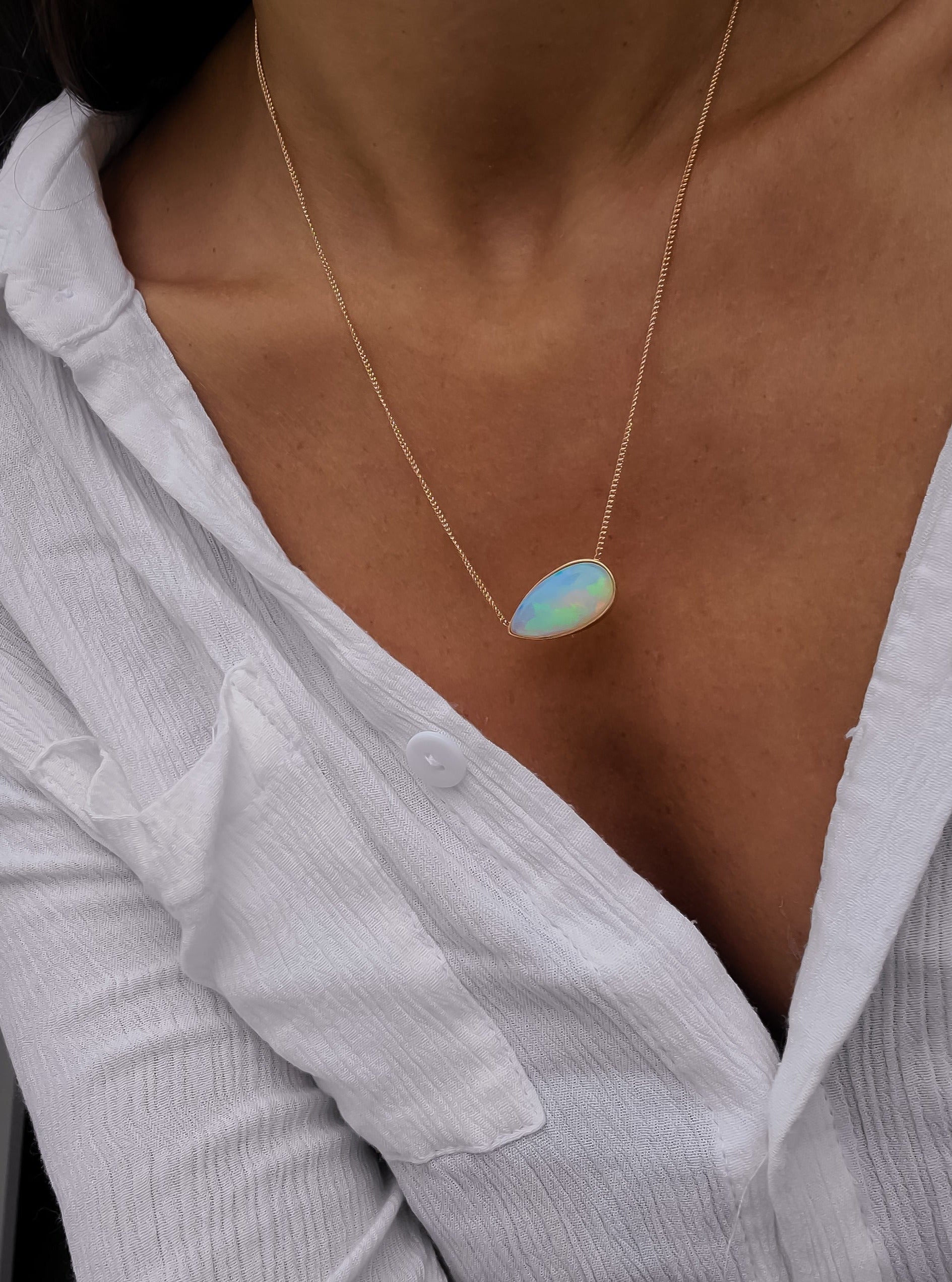 Big pear shape opal necklace in 14K rose gold