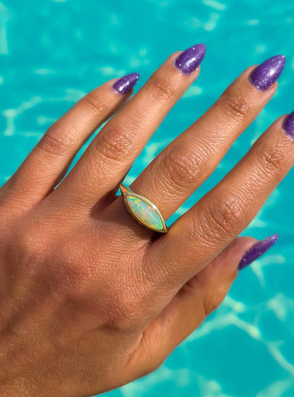 Elongated marquise shape opal ring in 14K gold 