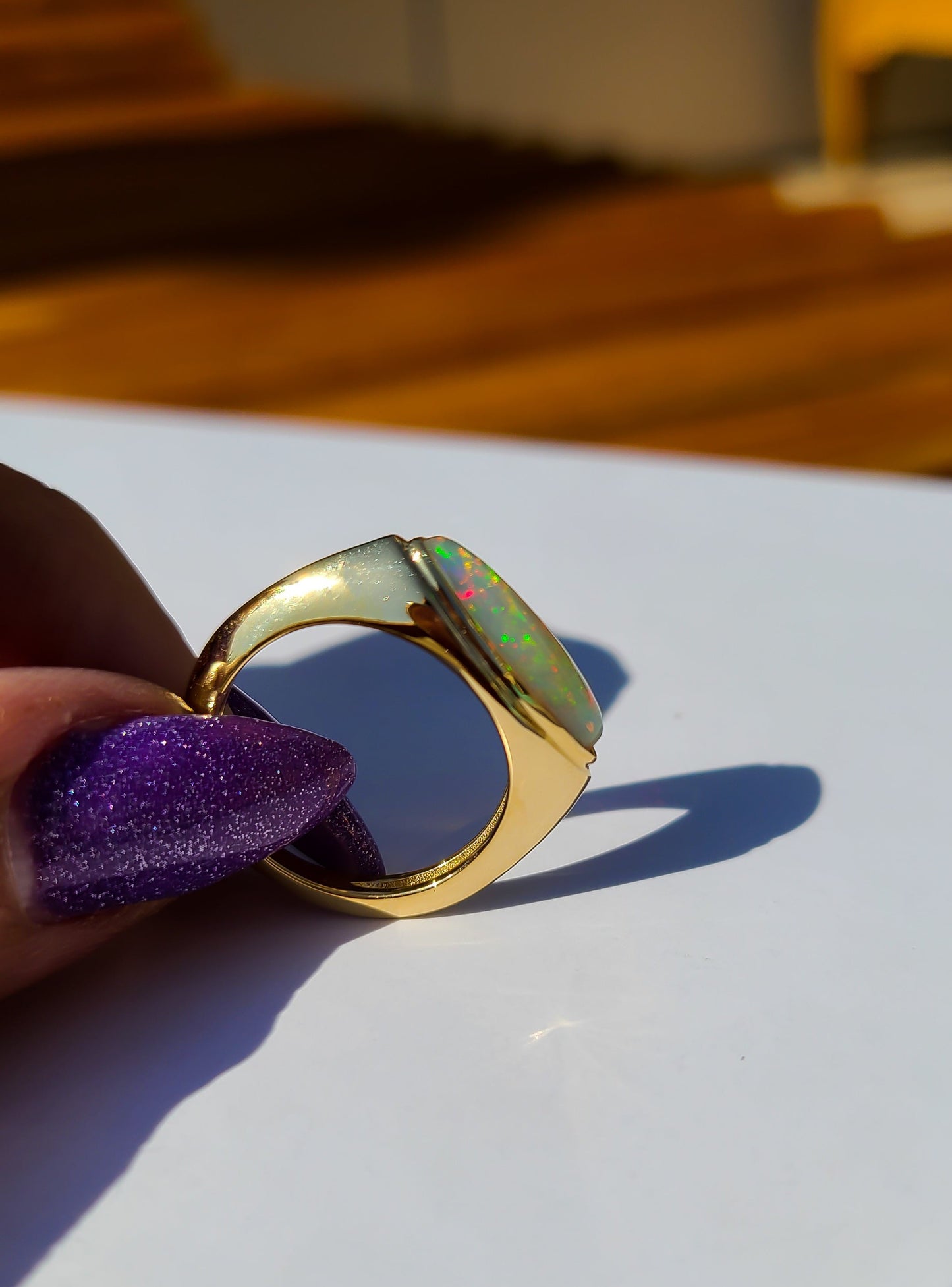 Elongated marquise shape opal ring in 14K gold