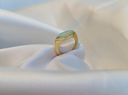 Elongated marquise shape opal ring in 14K gold