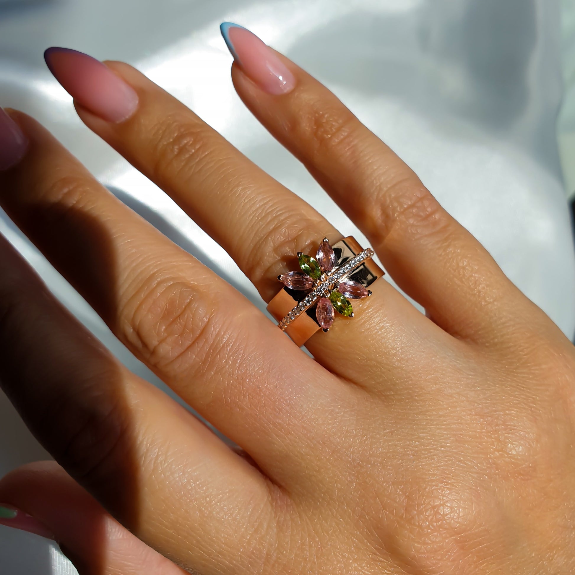 Lotus ring in 14K rose gold with natural diamonds and gemstones peridot and tourmaline marquise shape 