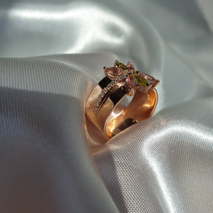 Lotus ring in 14K rose gold with natural diamonds and gemstones peridot and tourmaline marquise shape 