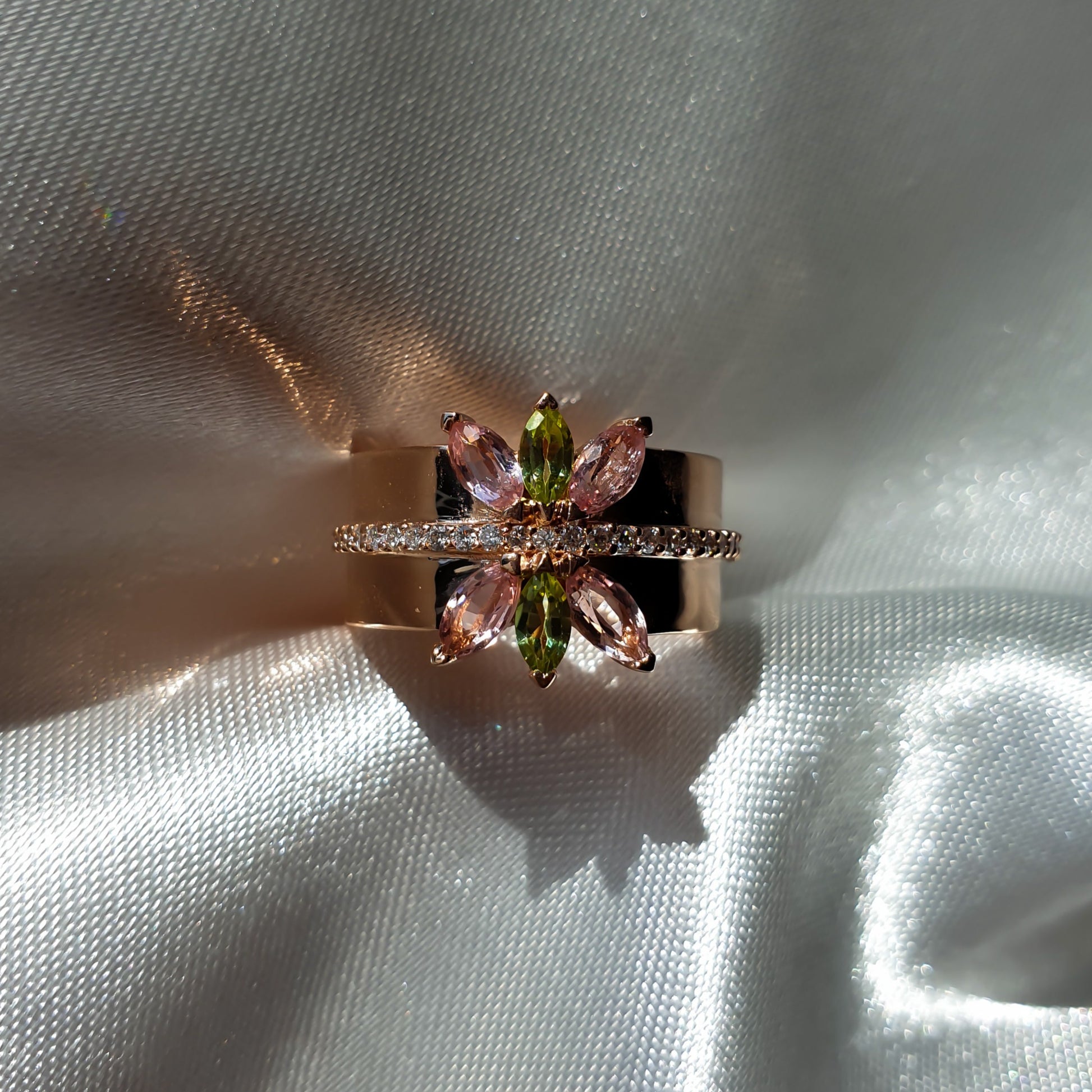 Lotus ring in 14K rose gold with natural diamonds and gemstones peridot and tourmaline marquise shape 