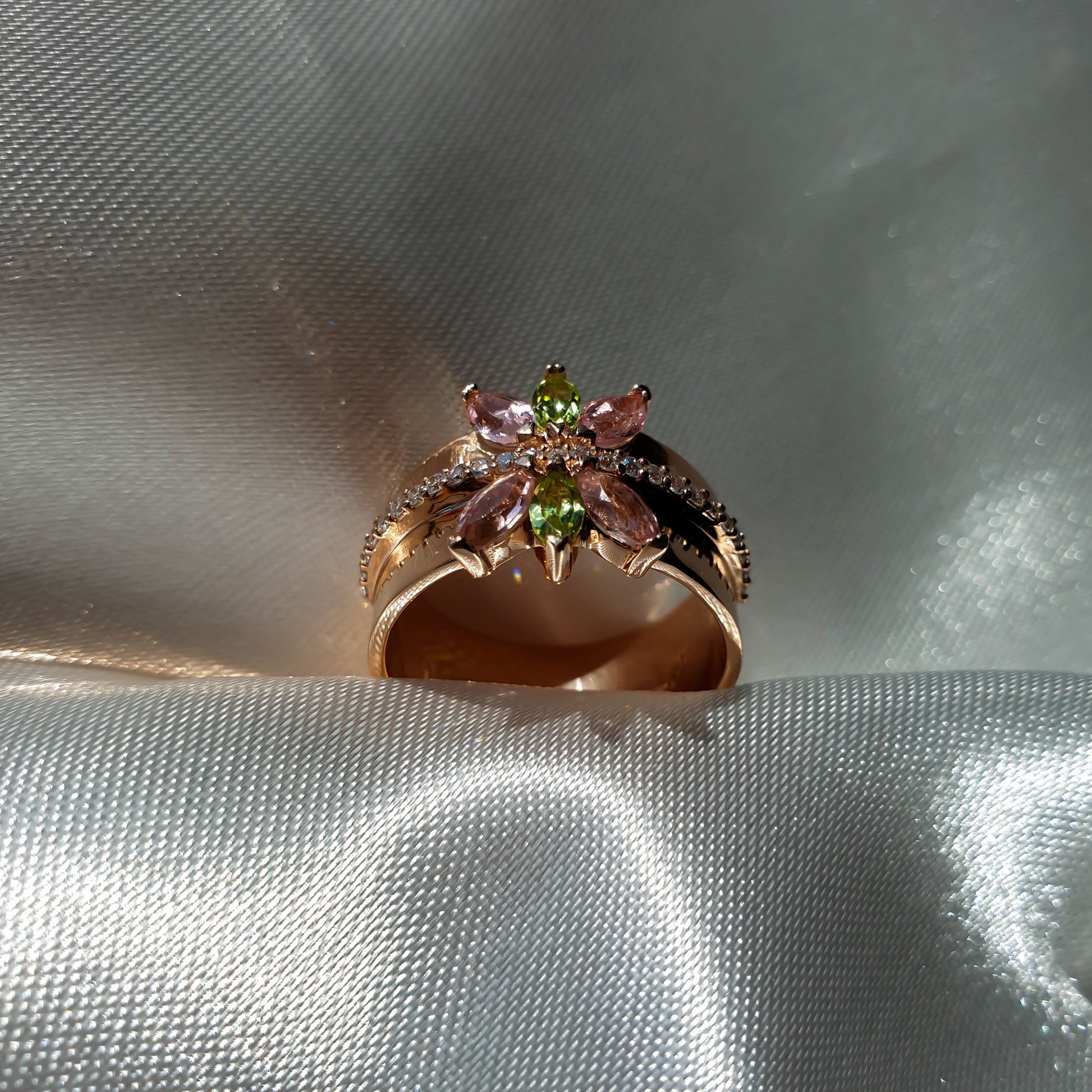 Lotus ring in 14K rose gold with natural diamonds and gemstones peridot and tourmaline marquise shape 