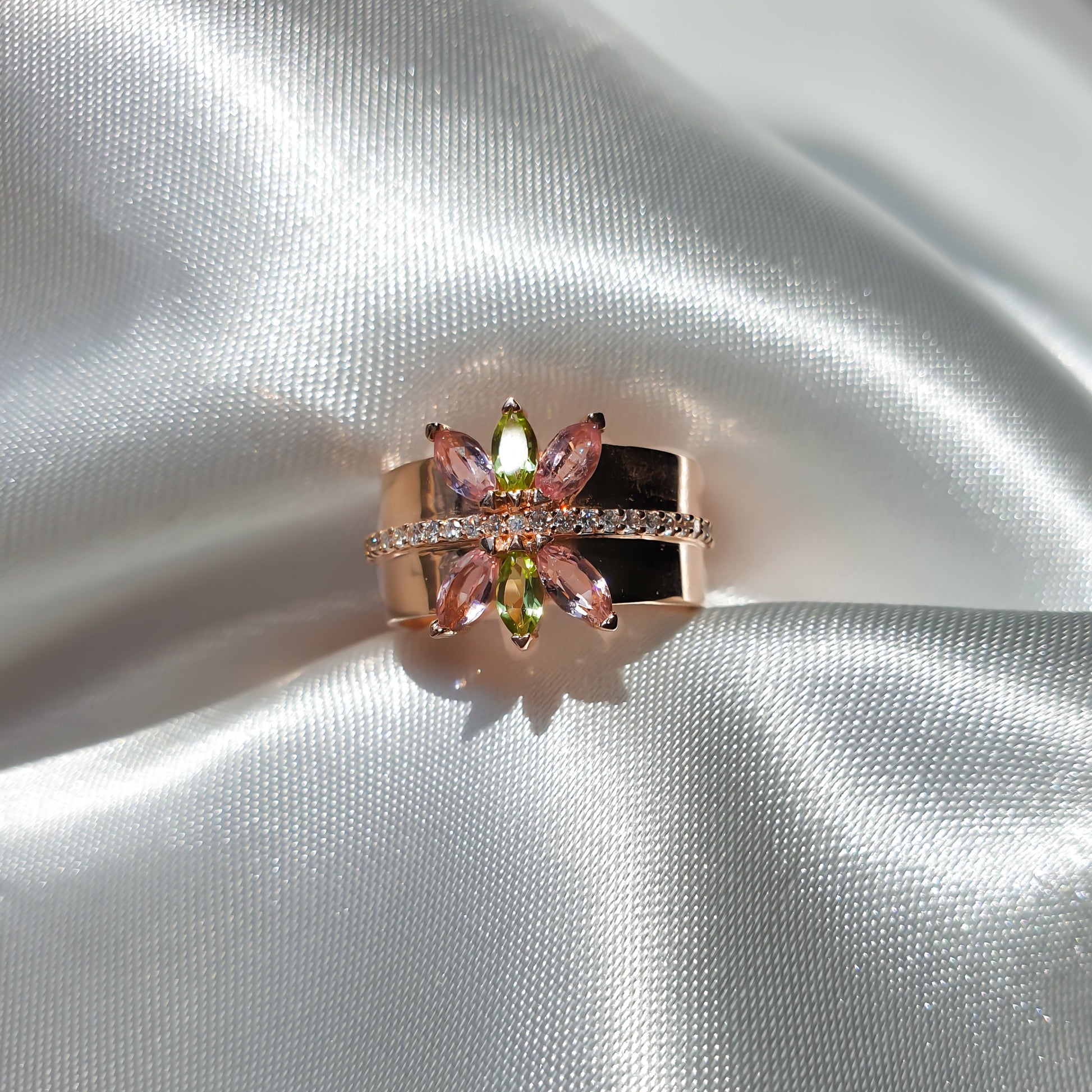 Lotus ring in 14K rose gold with natural diamonds and gemstones peridot and tourmaline in marquise shape 