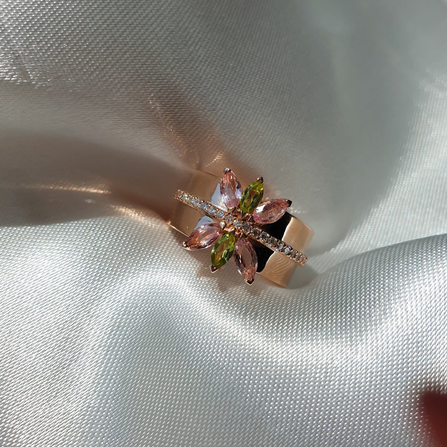 Lotus ring in 14K rose gold with natural diamonds and gemstones peridot and tourmaline marquise shape 