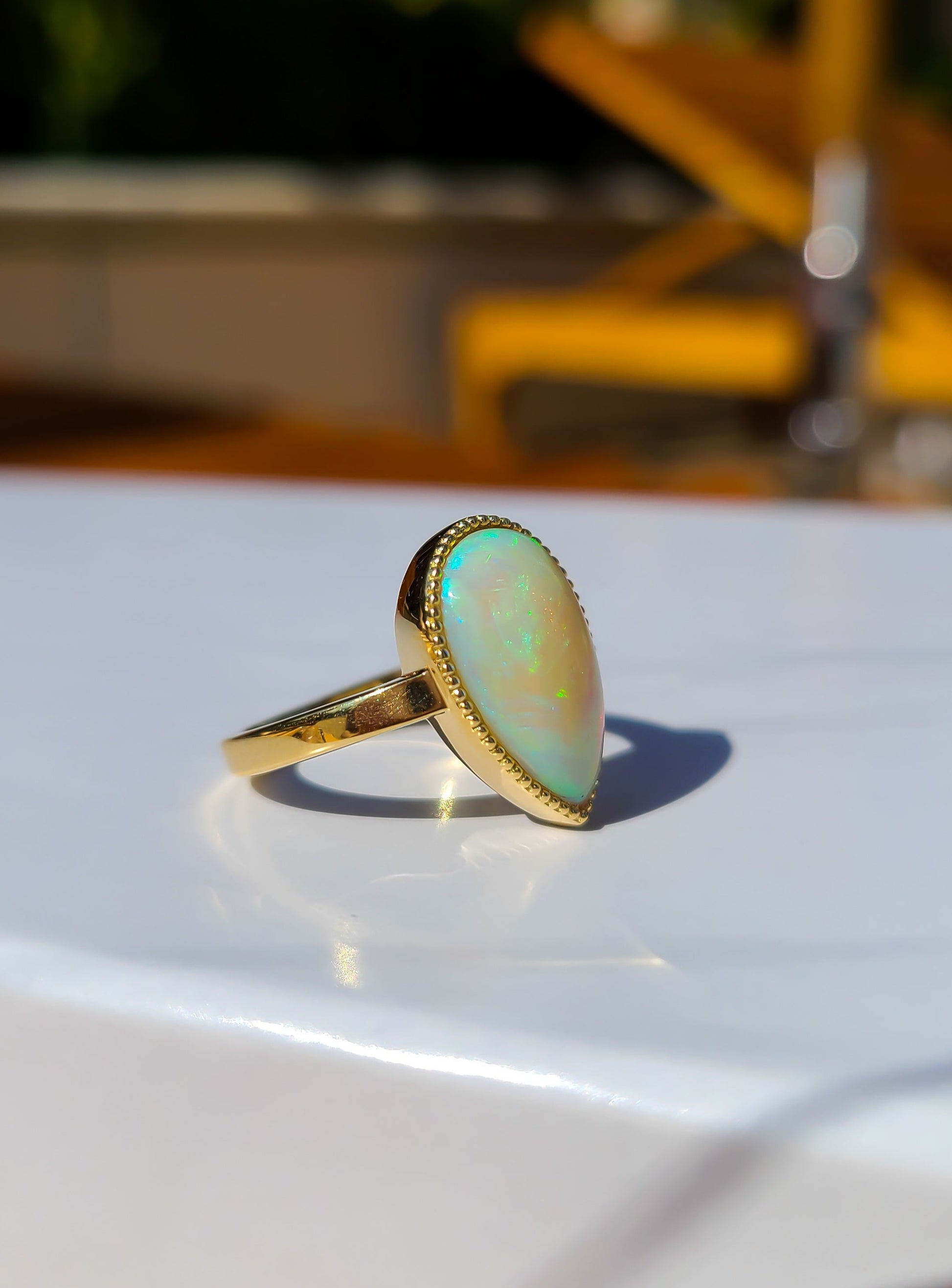 Pear shape big opal ring in 14K gold