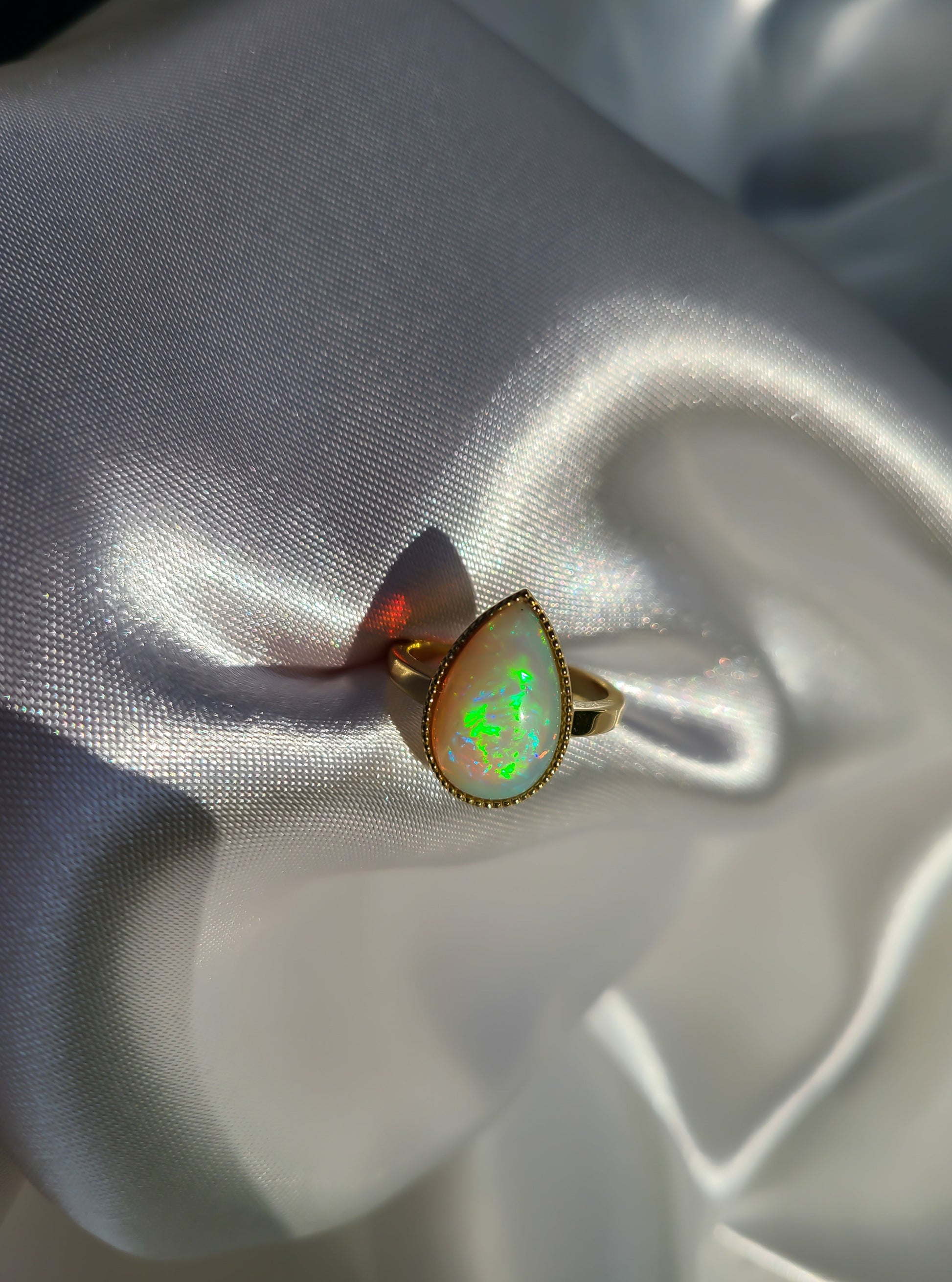 Pear shape big opal ring in 14K gold