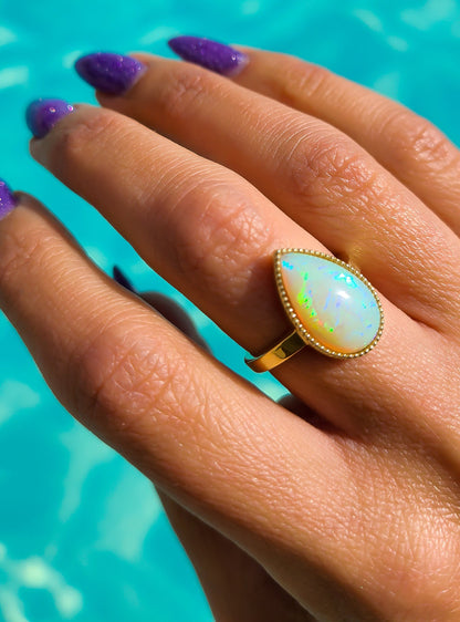 Pear shape big opal ring in 14K gold