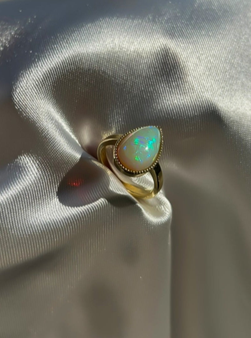 Pear shape big opal ring in 14K gold