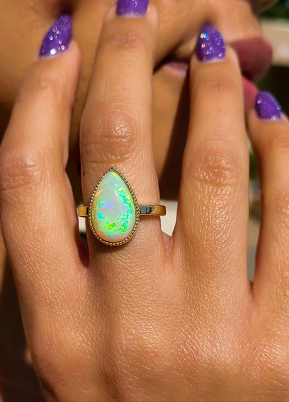 Pear shape big opal ring in 14K gold