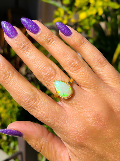 Pear shape big opal ring in 14K gold