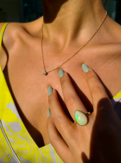 Pear shape big opal ring in 14K gold